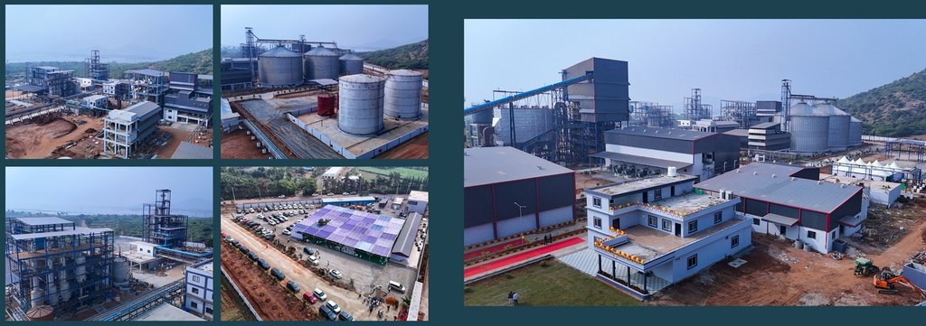 Distillery plant complex with grain silos and process towers