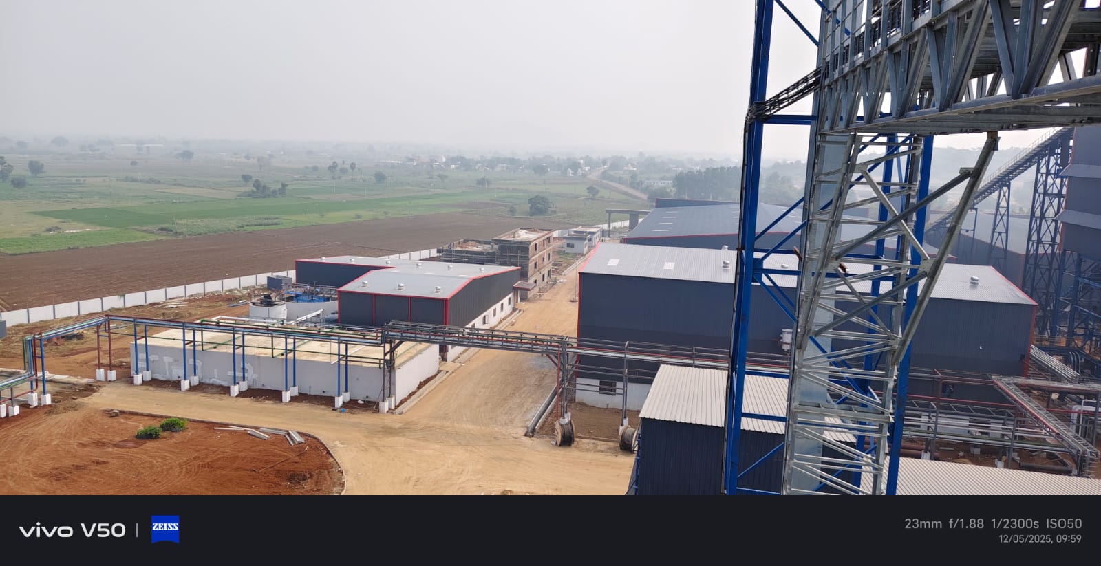 Plant sheds and utility corridor with piping racks